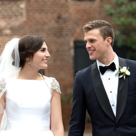 Isabelle Butker and Harrison Butker on their marriage day February 10, 2018