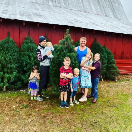 mckey sullivan with her husband sam alvey and her six children