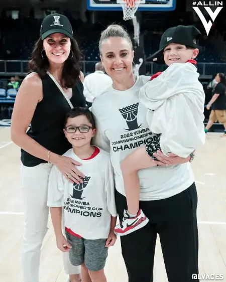 Brenda Milano and Becky Hammon with their adopted children Cayden and Samuel