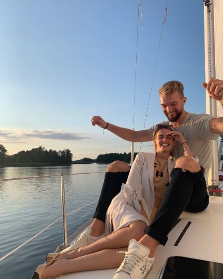 shoshana rosen with her husband domantas sabonis during a boat ride