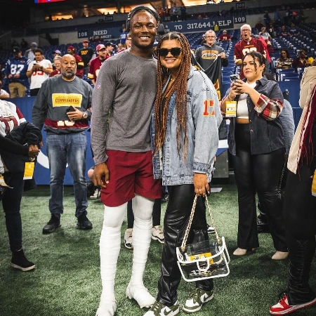 caitlin winfrey attending the NFL match 