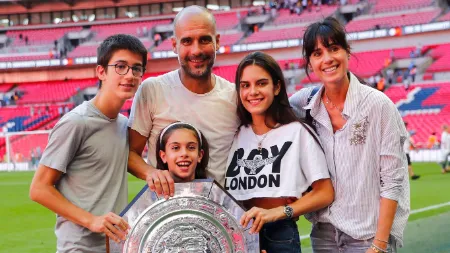 pep guardiola with his wife cristina serra and children maria, valentina, and marius guardiola