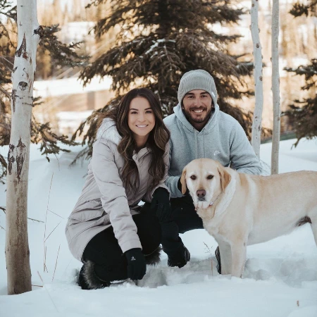 lacey croom and max homa with their dog scotty