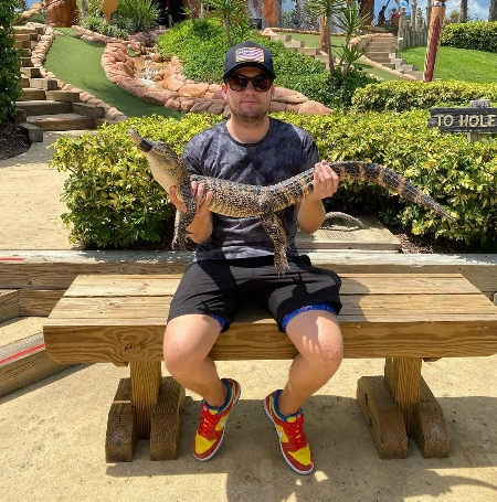 noah gragson holding wild animal 