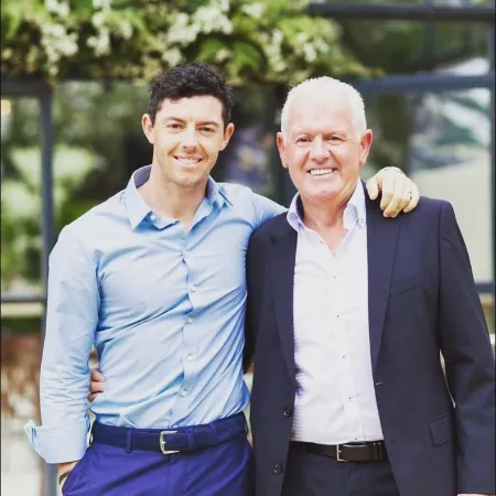 rory mcllroy with his father 