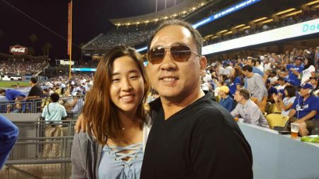 andrea lee golf with her father james lee in inside a stadium