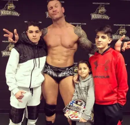 randy orton with his sons robbie, michael and antony after wwe match