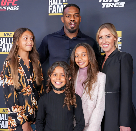 jon jones and jessie moses with their kids in the ufc event