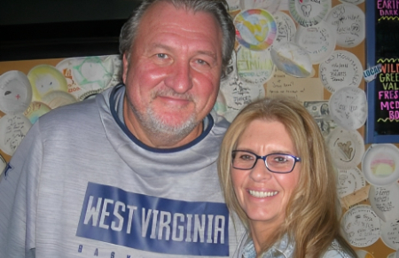 bob huggins hugging his wife june huggins