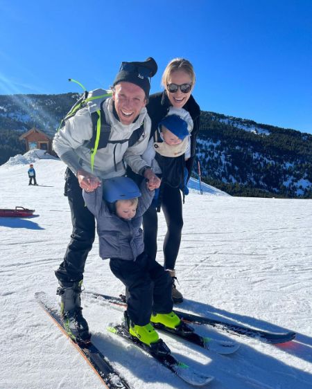 michael woods with his wife elly woods and two children maxine and willy woods on the snow