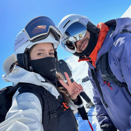 Shaun White snowboarding with his girlfriend.