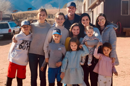 philip rivers with his wife and nine children on a vacation